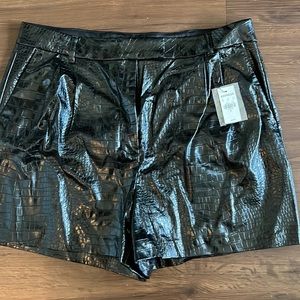 Black crocodile print shorts